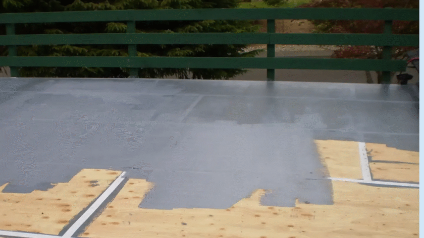 In-progress deck waterproofing with plywood and sealant a smart project by one of the best home improvement companies in Mount Pleasant, PA for year-round outdoor durability.