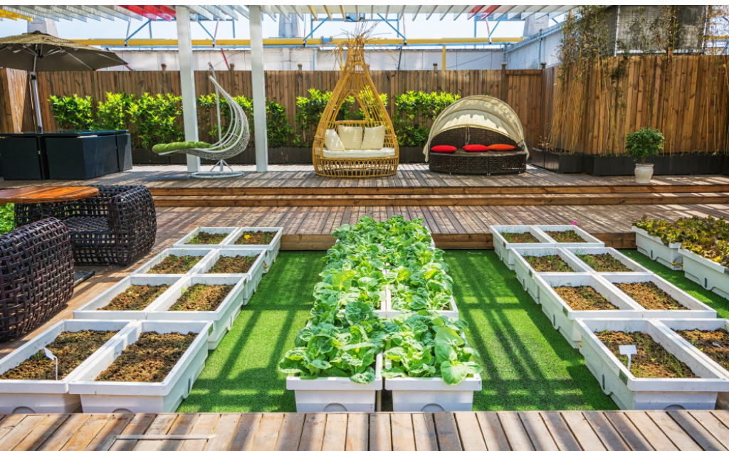 "Modern rooftop garden installation by a home improvement company in PA featuring raised vegetable beds, stylish outdoor seating, and lush greenery – a perfect example of home improvement in Mount Pleasant, PA."